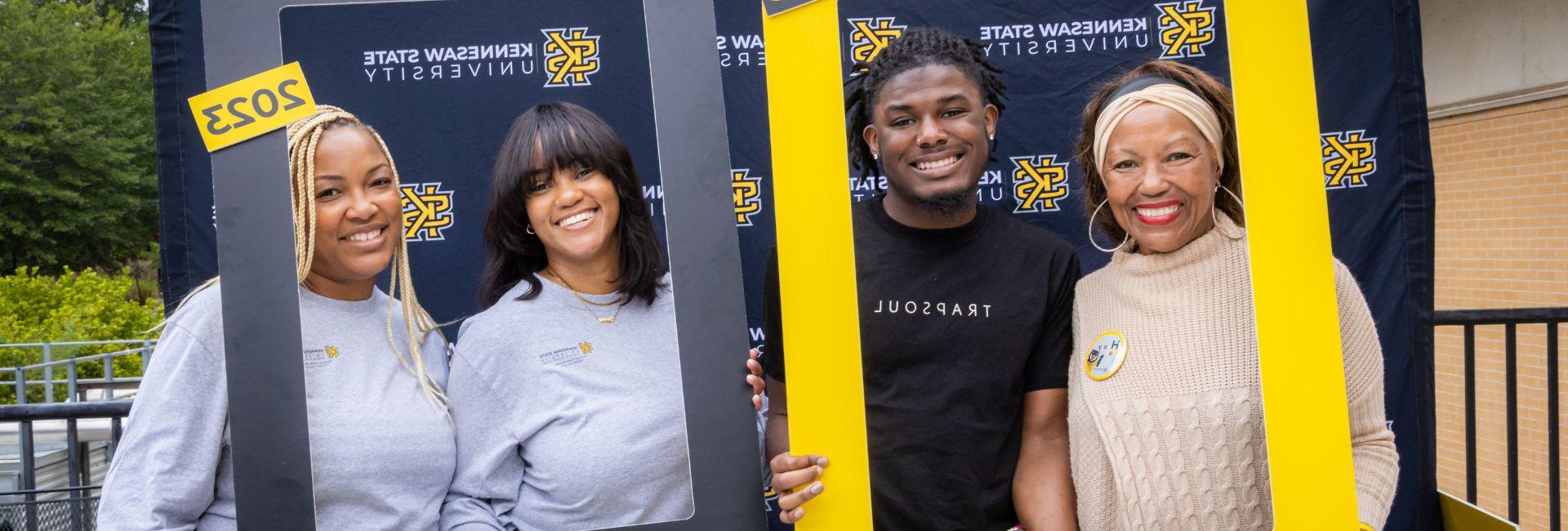 ksu student posing with family members